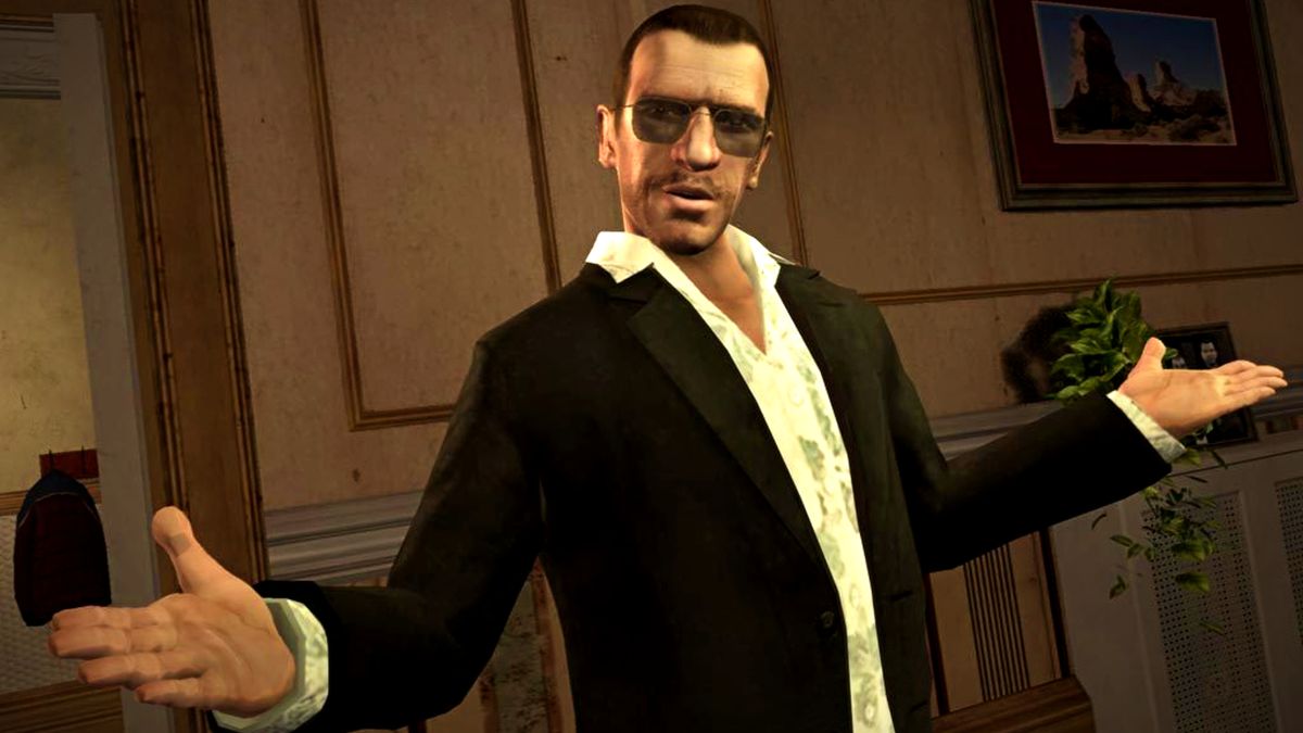 Grand Theft Auto IV screenshot showing a middle-aged man with short brown hair and dark sunglasses wearing a black suit jacket and white shirt posing with his arms open