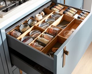 Kitchen drawer with inserts for jars and spices