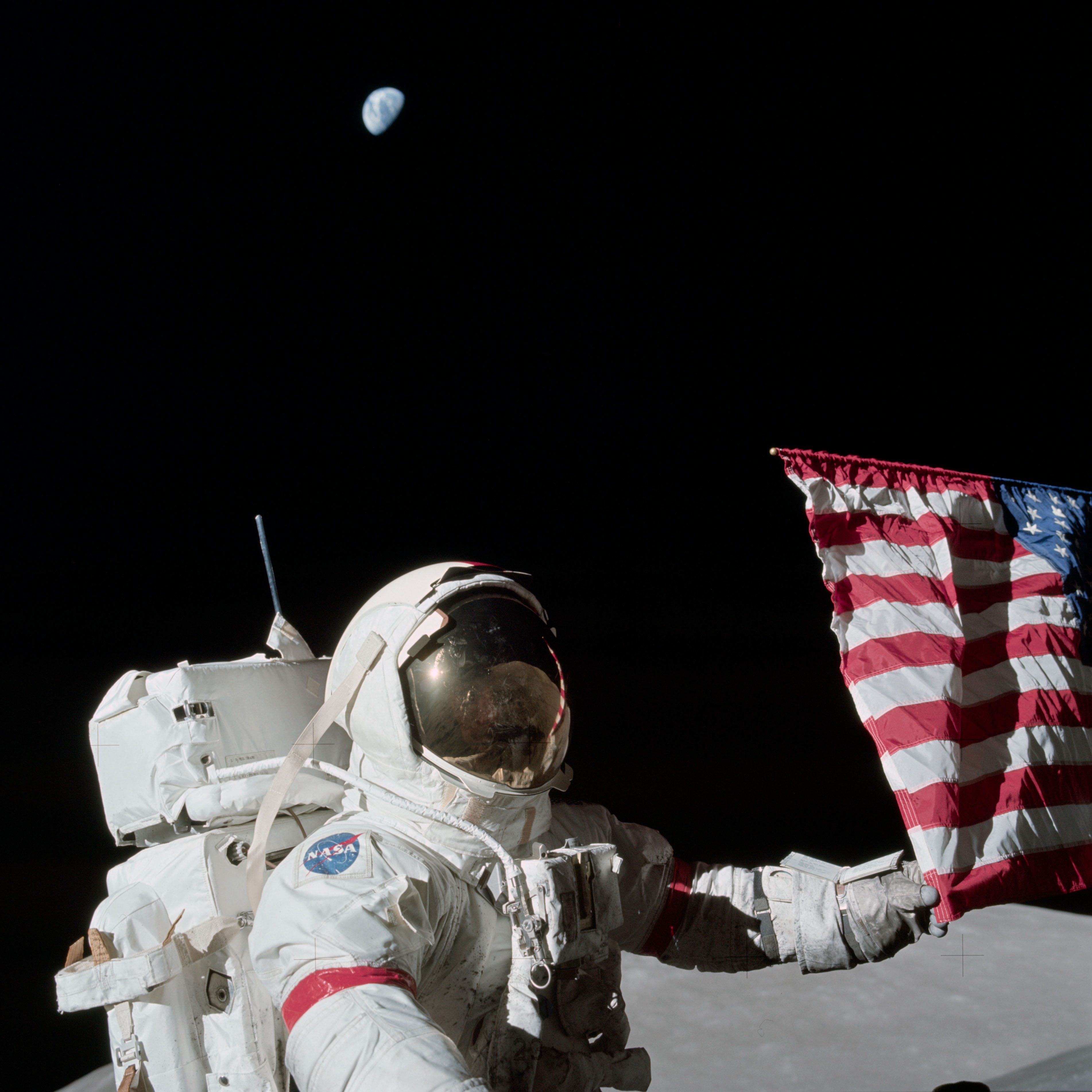 Eugene Cernan and US flag on the moon