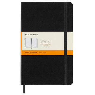 black moleskin notebook