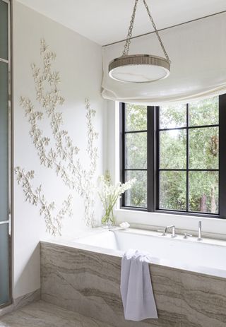 A bathroom with bespoke plasterwork