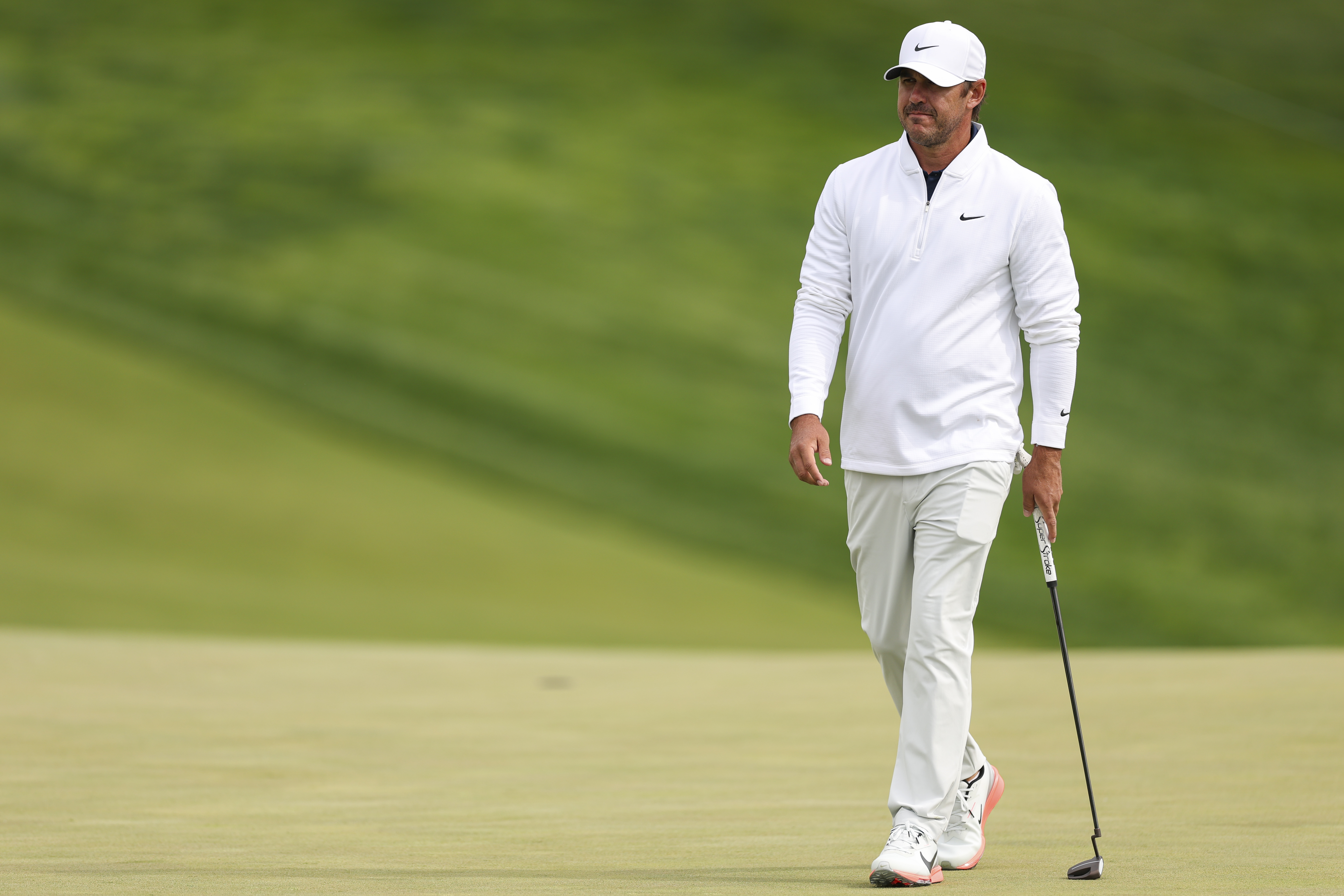Brooks Koepka looks on during the PGA Championship Practice Round at Aronimink Golf Club