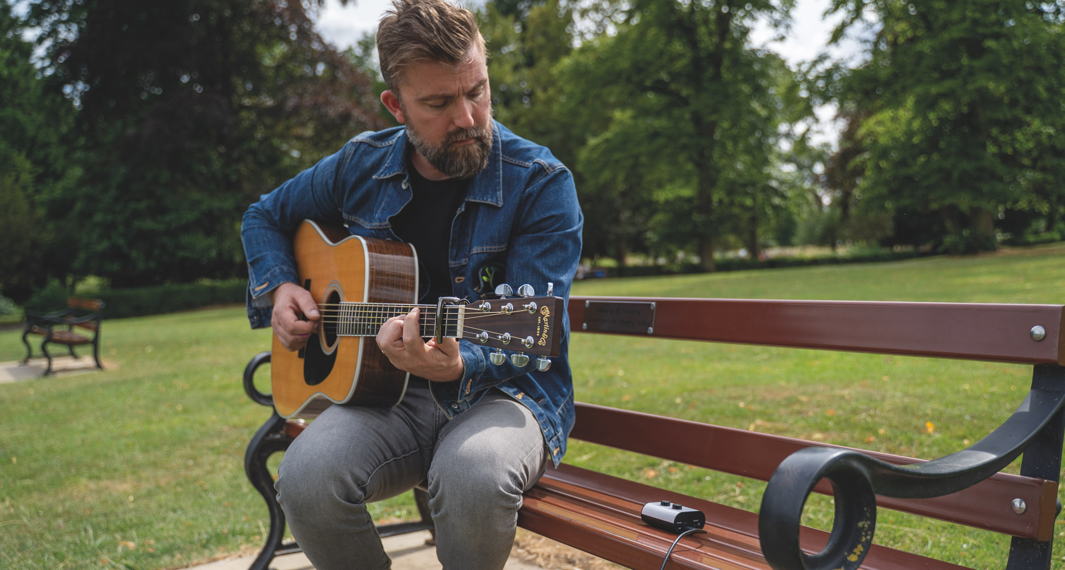 Blackstar Amplification Polar Go: the super-compact audio interface has a white fascia, black knobs and sides, and is small enough to fit inside the palm of your hand.