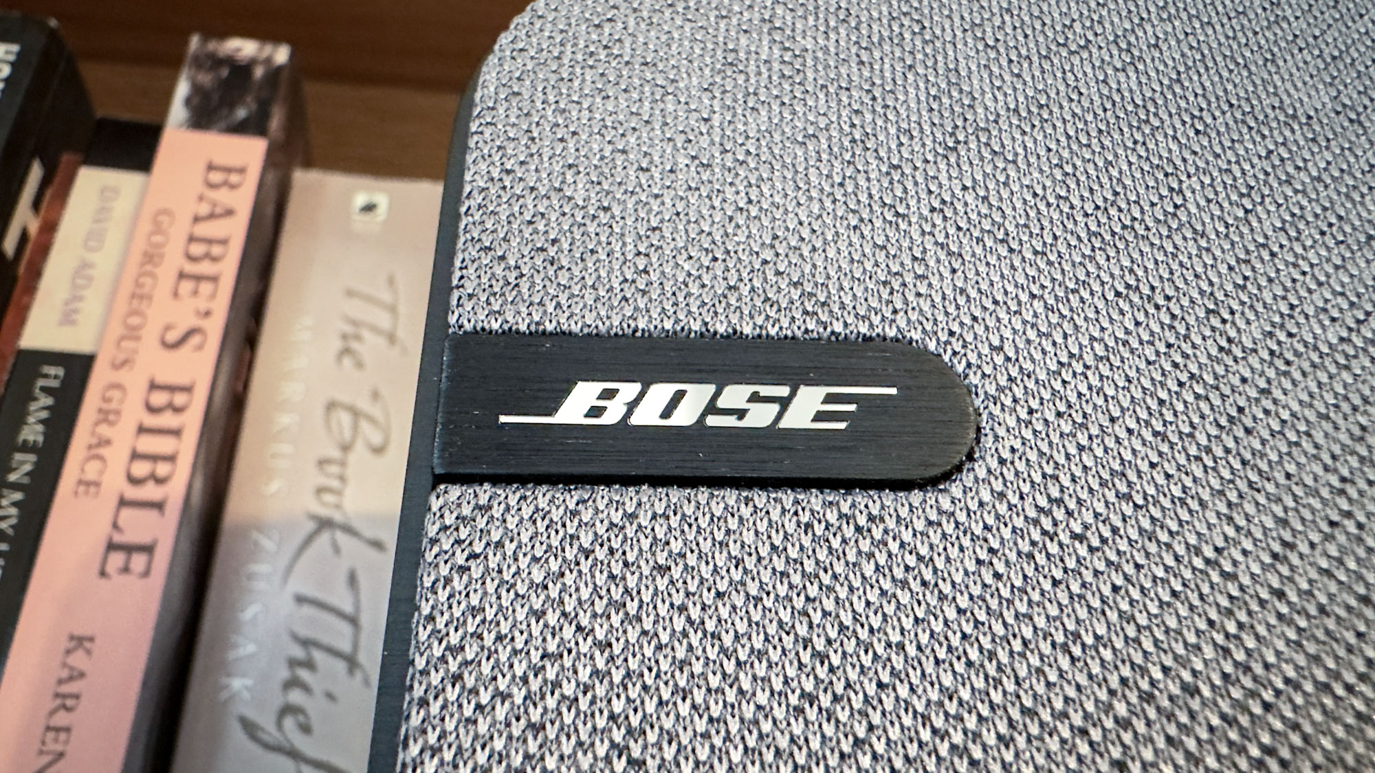 Bose SoundLink Home on a bookshelf