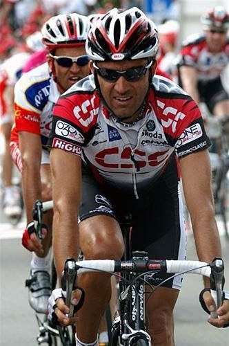 Andrea Peron (CSC) finished his coffee and at work during stage 1