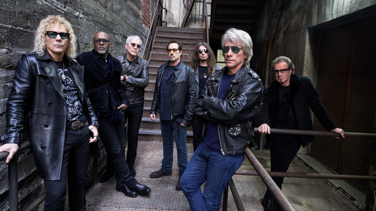 Bon Jovi stood in an alleyway