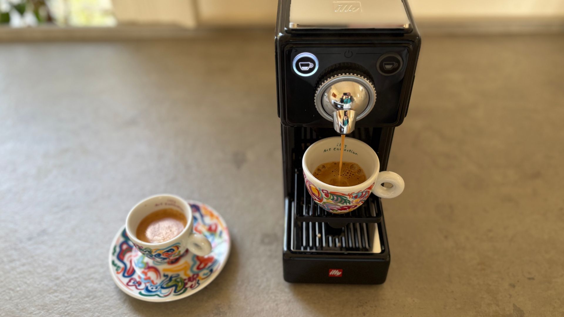 two espressos made in the illy X3 coffee machine 