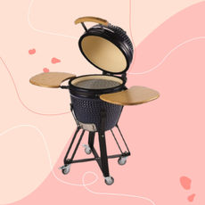 Aldi Kamado BBQ on pink background.