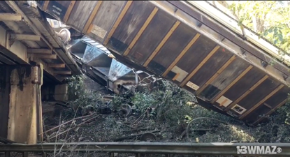 Train car falling off a bridge in Georgia.
