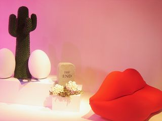 'God' (far left) and 'The End' (centre), by Toiletpaper duo Maurizio Cattelan and Pierpaolo Ferrari for Gufram, sit alongside the brand's 'Hot Lips' sofa