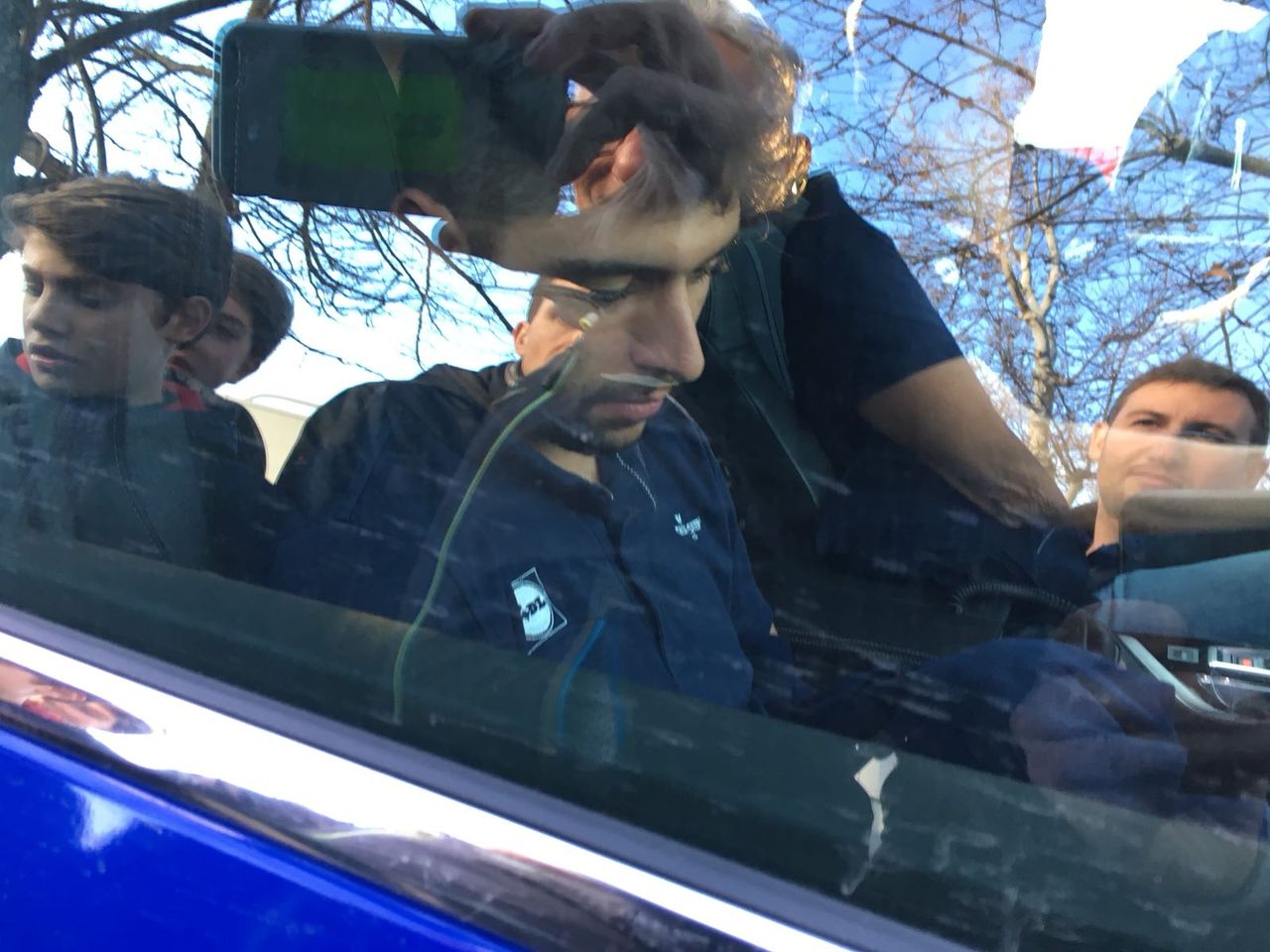 Fernando Gaviria looking glum as he leaves the race after fracturing his hand