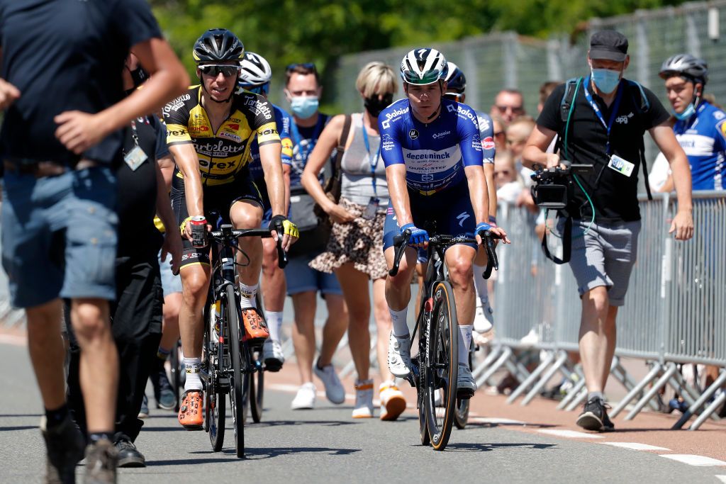 BERINGEN BELGIUM JUNE 13 Remco Evenepoel of Belgium and Team Deceuninck QuickStep Blue Leader Jersey celebrates at arrival during the 90th Baloise Belgium Tour 2021 Stage 5 a 1787km stage from Turnhout to Beringen baloisebelgiumtour on June 13 2021 in Beringen Belgium Photo by Bas CzerwinskiGetty Images