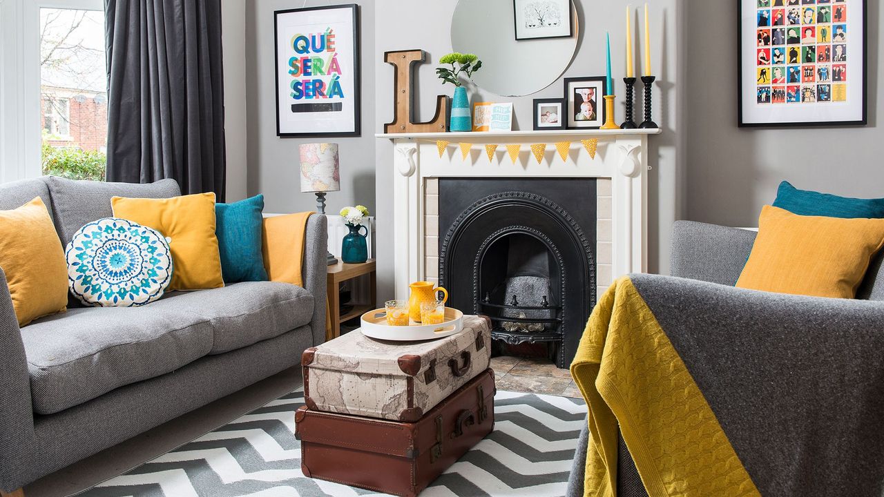 living room with grey sofa and fire place