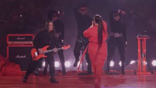 Nuno Bettencourt (left) performs with Rihanna at the 2023 Super Bowl halftime show