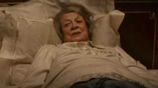 Dame Maggie Smith lies on her death bed during her final words in Downton Abbey: A New Era.