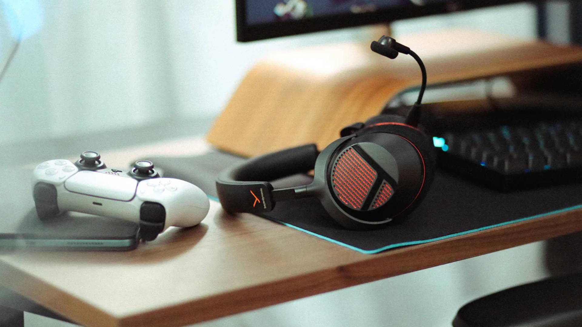 Image of the Beyerdynamic MMX 130 Wireless gaming headset on a desk.