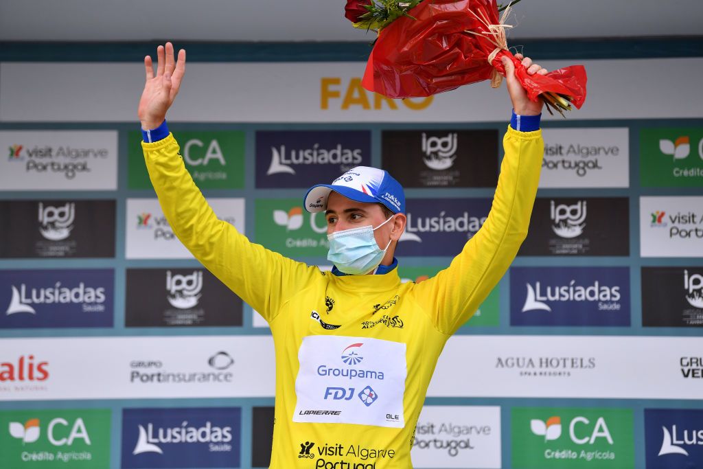 FARO PORTUGAL FEBRUARY 18 David Gaudu of France and Team Groupama FDJ celebrates winning the yellow leader jersey on the podium ceremony after the 48th Volta Ao Algarve 2022 Stage 3 a 2114km stage from Almodvar to Faro VAlgarve2022 on February 18 2022 in Faro Portugal Photo by Luc ClaessenGetty Images