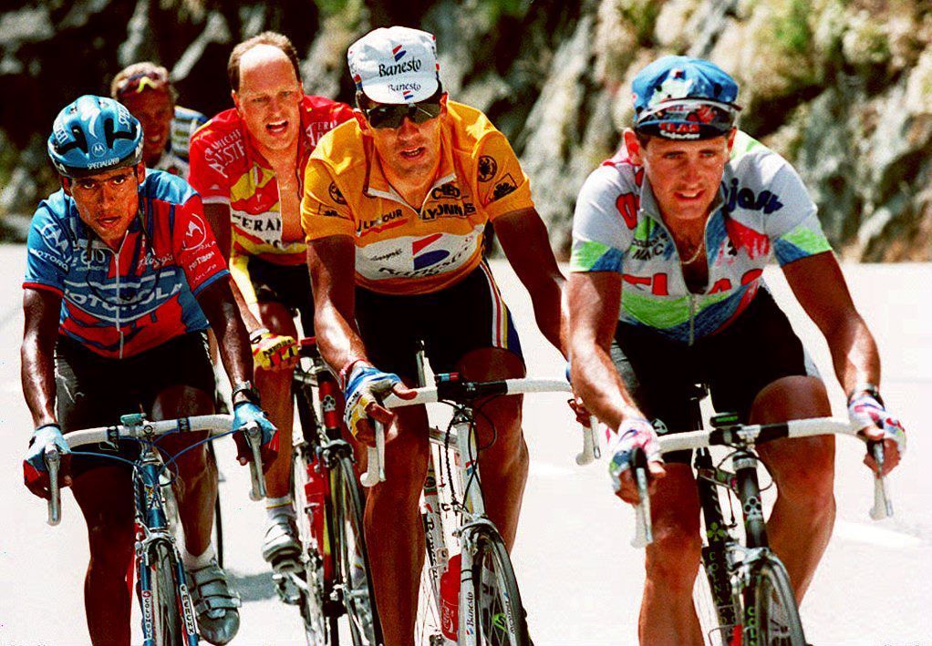 Swiss rider Tony Rominger R Spaniard Miguel Indurain 2nd R Danish Bjarne Riis 2nd L and Columbian Alvar Mejia L race ahead of the pack in the highest climb of the Tour the 2802meterhigh pass of La Bonette in the Alps 15 July 1993 during the 11th stage of the cycling race Rominger won the stage Photo by Pascal PAVANI AFP Photo credit should read PASCAL PAVANIAFP via Getty Images