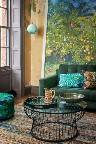 Matthew Williamson for John Lewis green sofa with patterned cushions