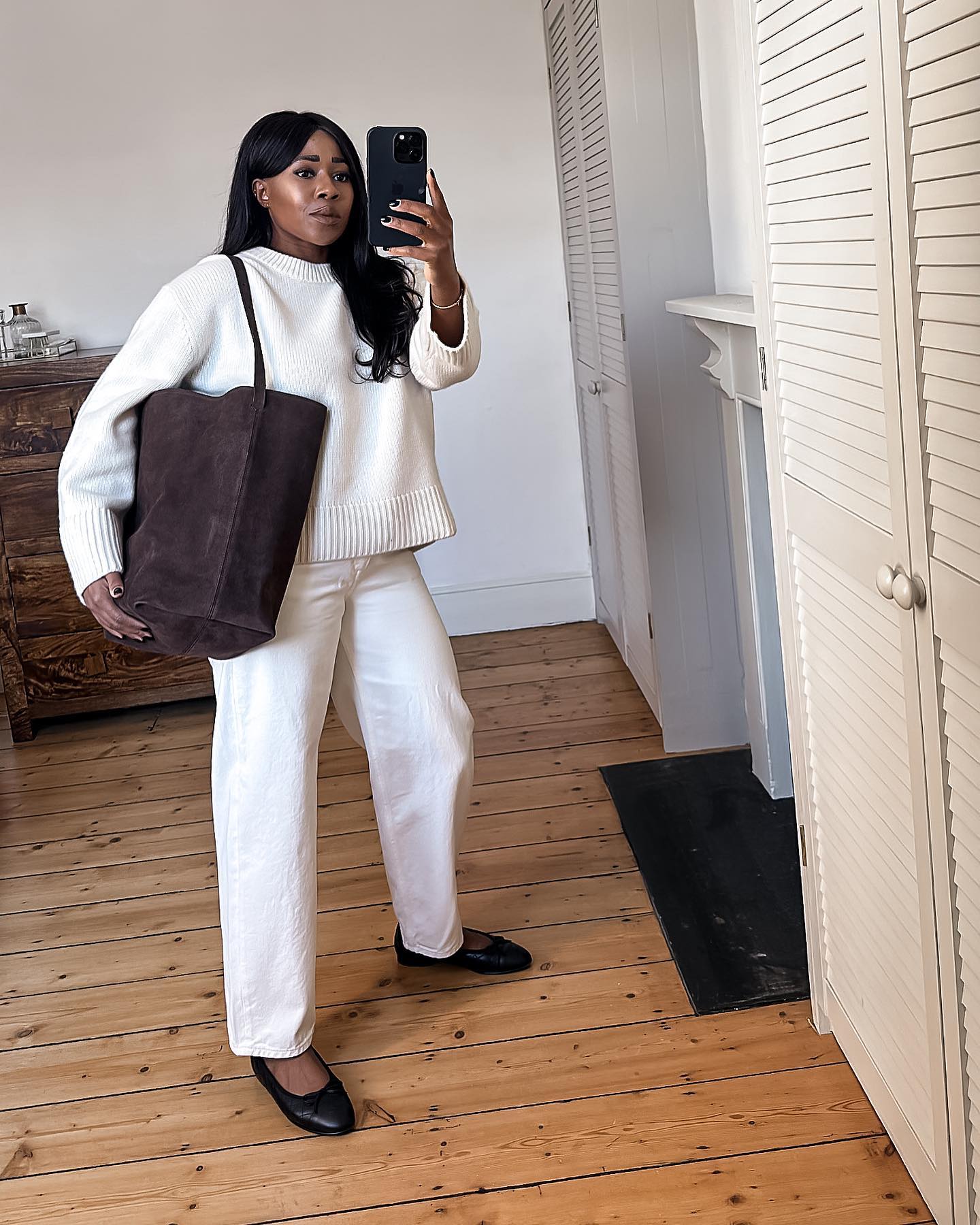 Influencer styles the Arket suede tote bag.