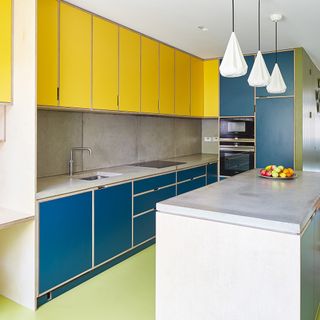 kitchen with blue and yellow cabinets