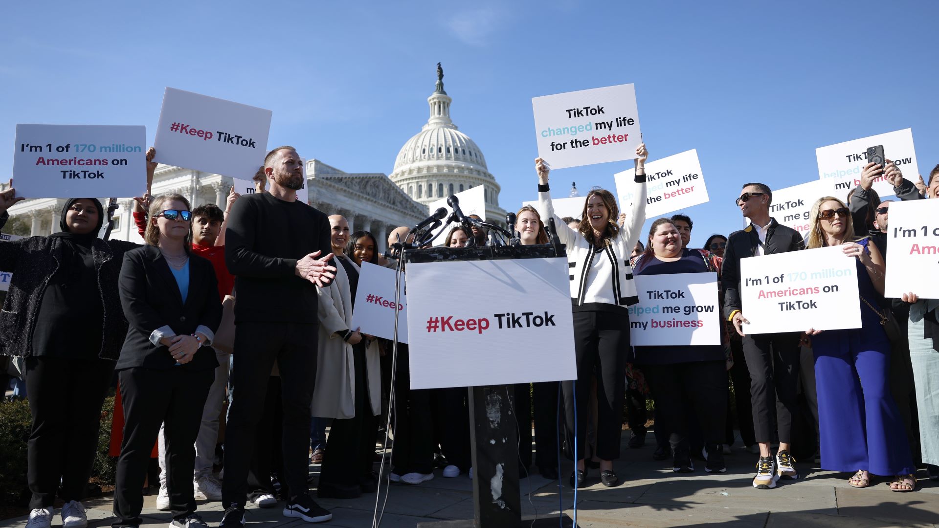 Participants hold up signs in support of TikTok at a news conference outside the U.S. Capitol Building on March 12, 2024 in Washington, DC.