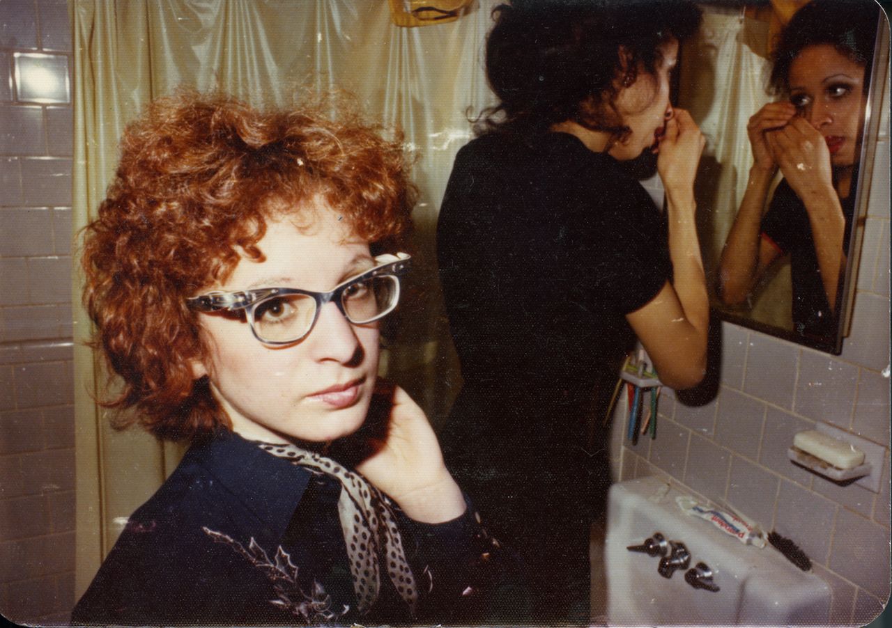 Nan in the bathroom with roommate, 1970s, from &#039;All the Beauty and the Bloodshed&#039;