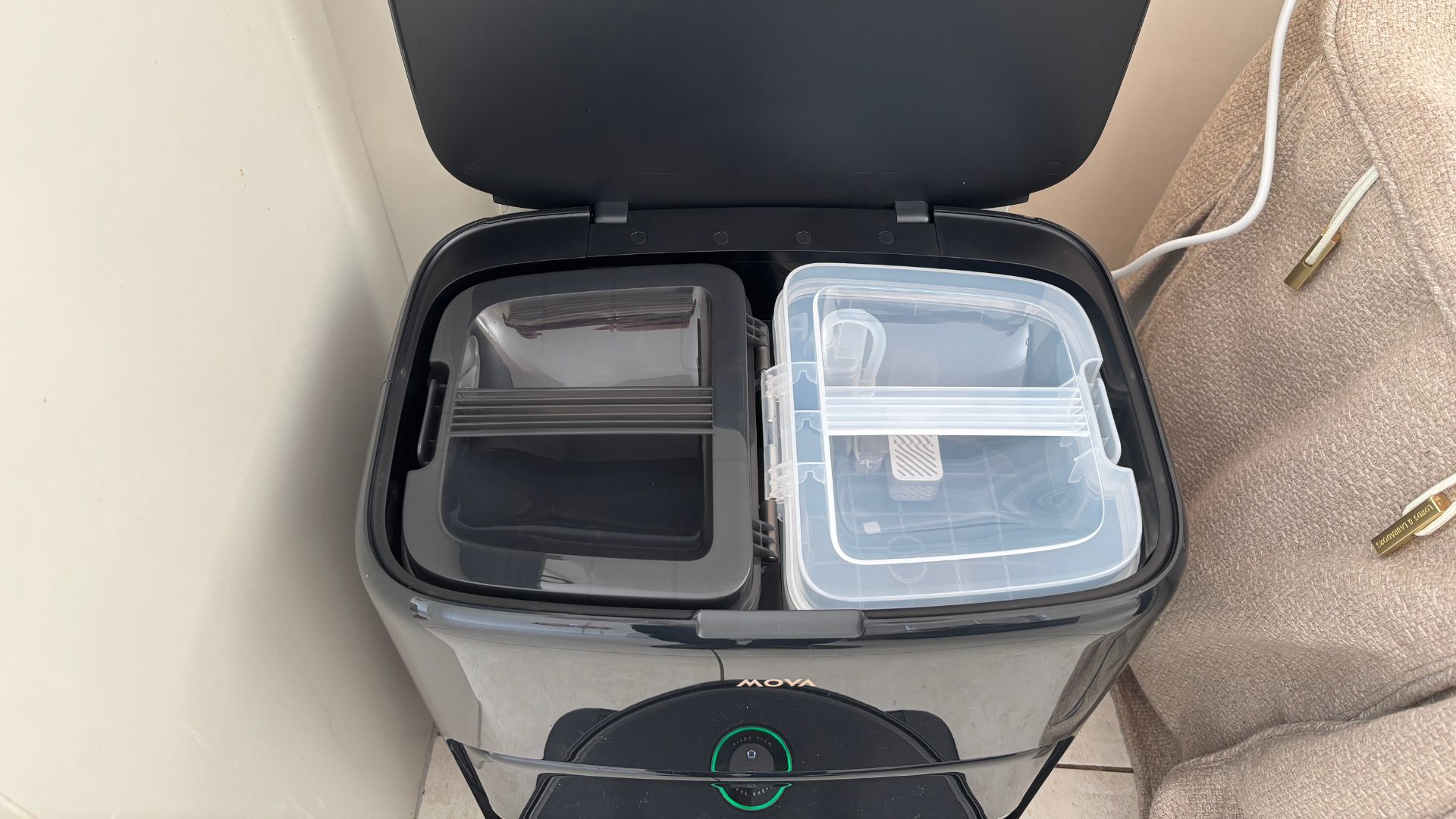 MOVA Z60 Ultra Roller Complete Robot Vacuum working on wooden floors in Carly's home