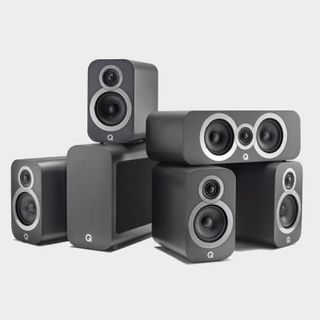 Q Acoustics 3010i Cinema Pack speakers with grey backdrop