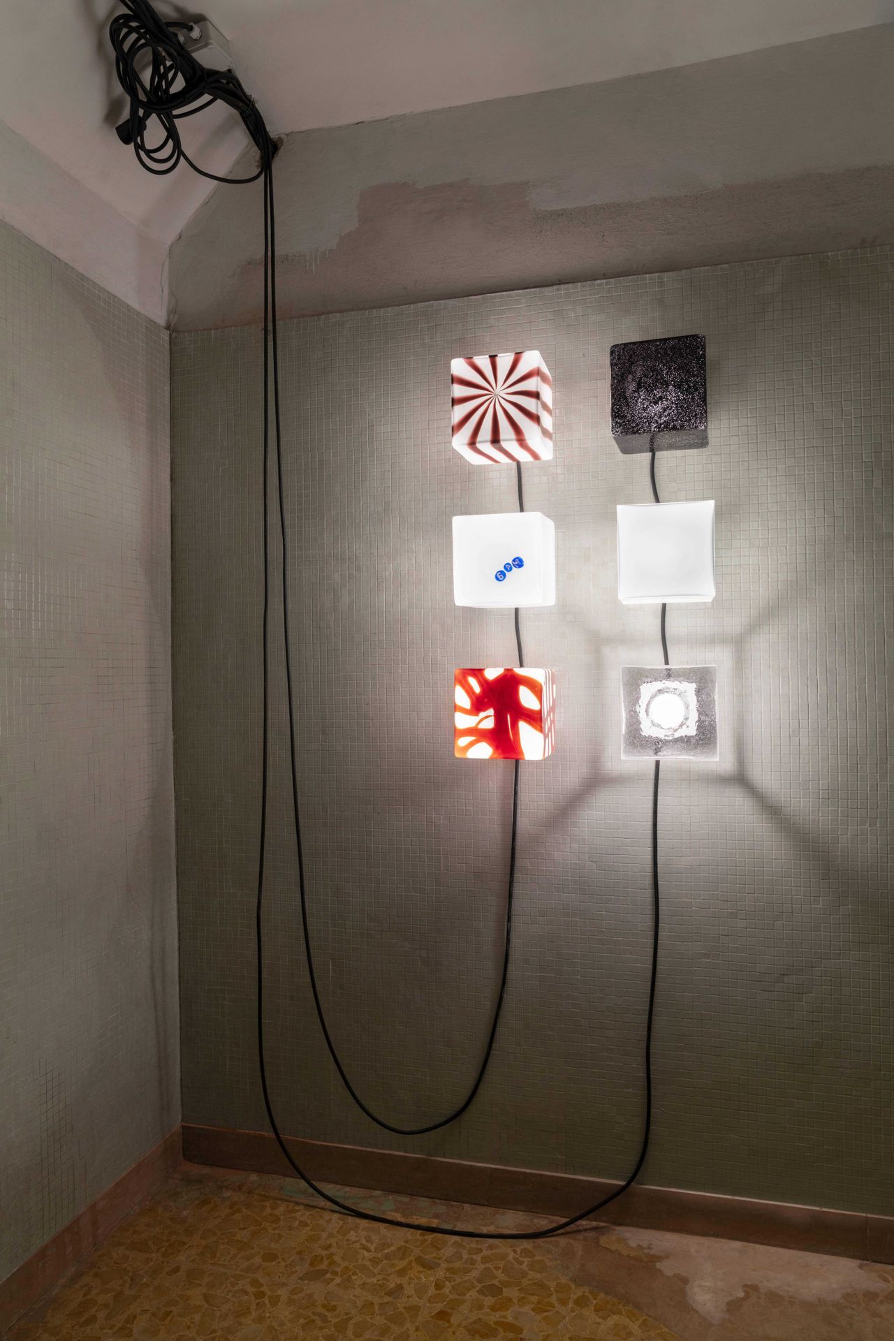 Murano glass lighting installed in a former swimming pool
