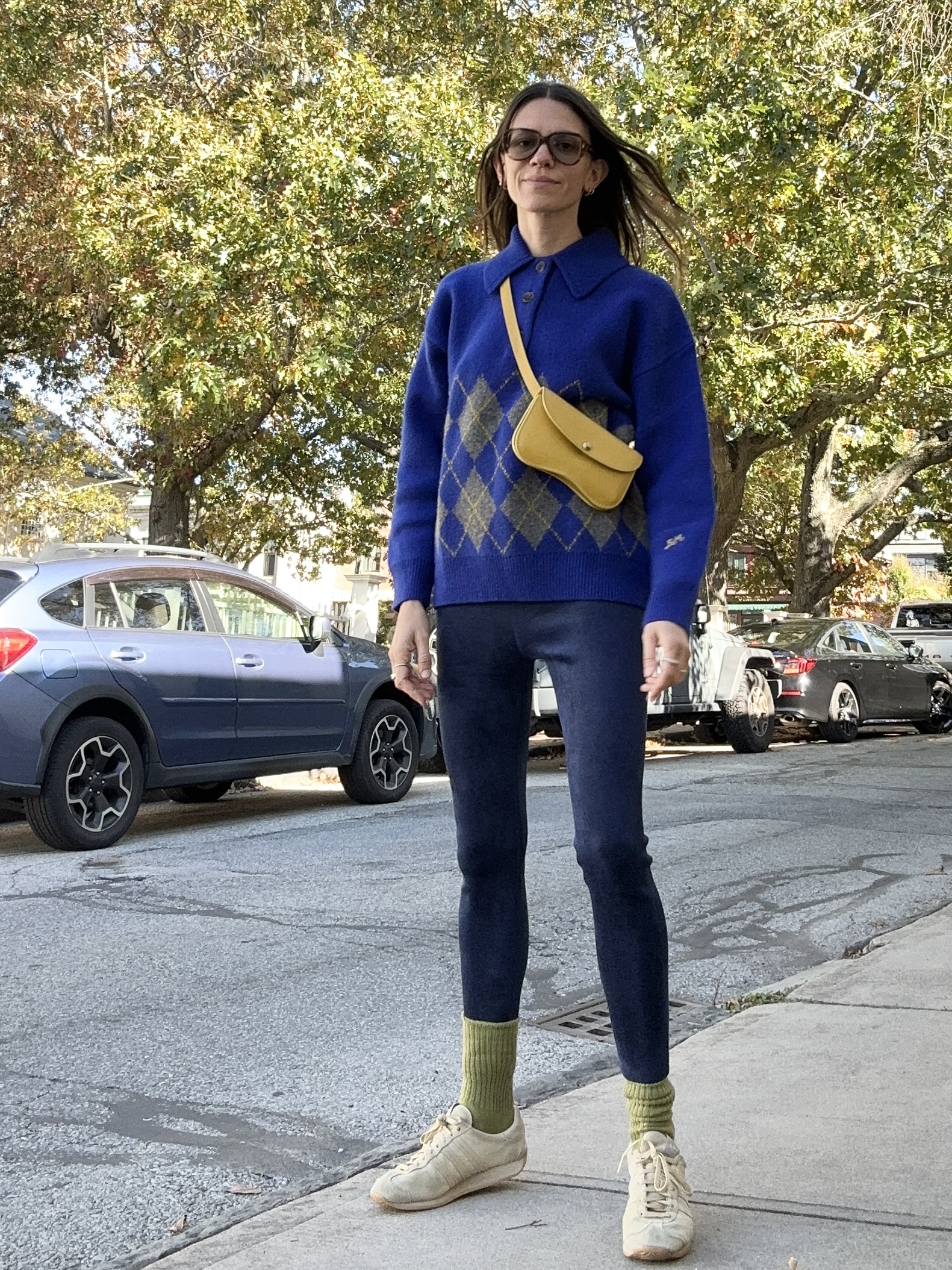 julia gall wearing an argyle sweater outfit