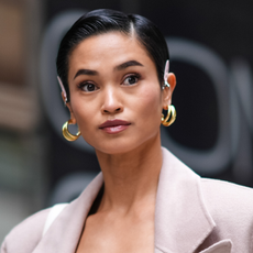 Woman during New York Fashion Week with a cropped hairstyle and beautiful groomed and bushy brows - revitabrow