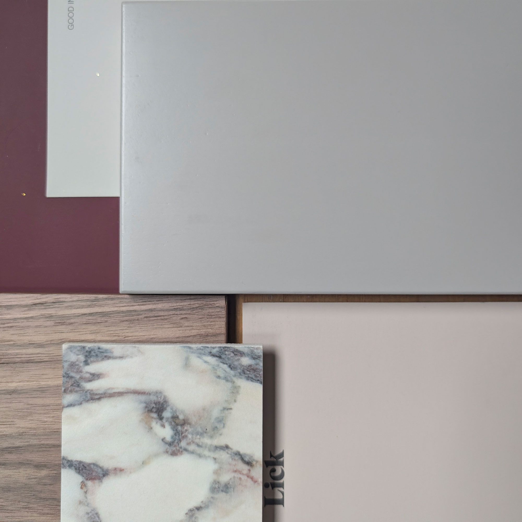 Flat lay of stones, woods and paint samples