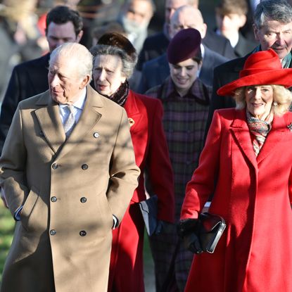 King Charles walking with Queen Camilla on Christmas Day with Princess Eugenie and Princess Anne walking behind