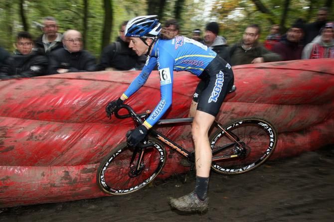 European champion Helen Wyman (Kona) up close and personal with a retention barrier on a tricky descent