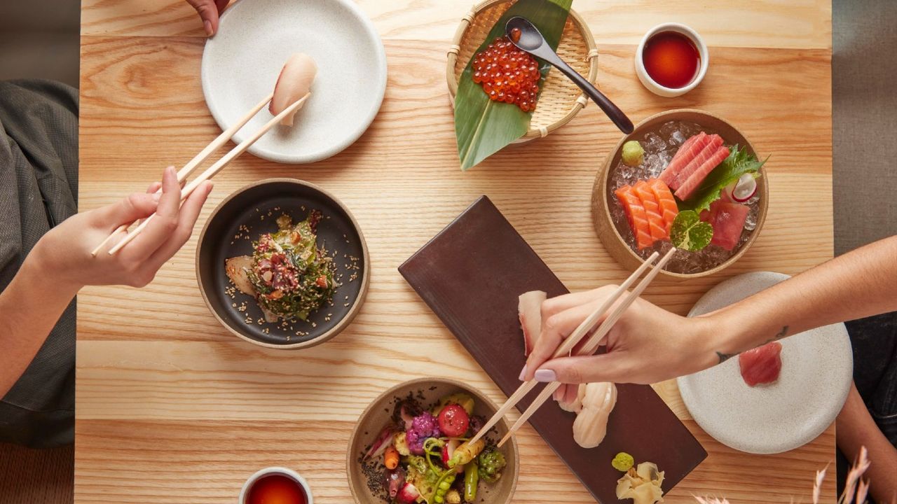 A spread of Sumi&amp;#039;s salad and sushi dishes 