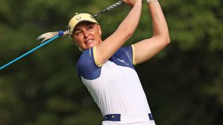 Charley Hull takes a shot in the Solheim Cup singles session