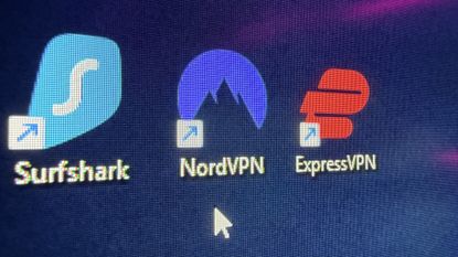 Surfshark, NordVPN, and ExpressVPN shortcuts on a gaming PC desktop