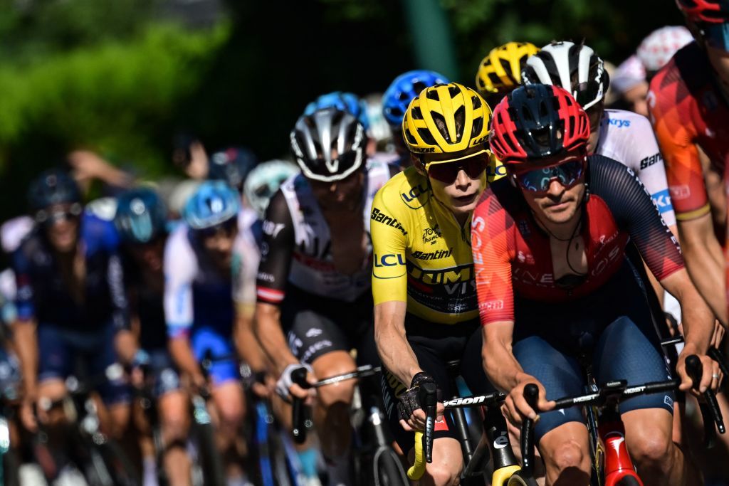 JumboVismas Danish rider Jonas Vingegaard wearing the overall leaders yellow jersey cycles with the pack of riders in the ascent of the Puy de Dome in the final kilometers of the 9th stage of the 110th edition of the Tour de France cycling race 1825 km between SaintLeonarddeNoblat and Puy de Dome in the Massif Central volcanic mountains in central France on July 9 2023 Photo by Marco BERTORELLO AFP Photo by MARCO BERTORELLOAFP via Getty Images