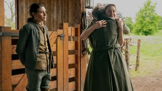 Claire hugs Lizzie next to one of the Beardsleys in Outlander season 7 episode 3