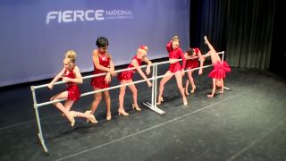 The opening pose for the group dance "Bittersweet Charity"