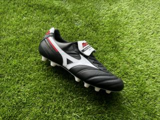 Mizuno Morelia II Made in Japan black and white football boots shot on green astro turf