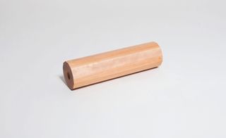 12 sided birch wood roller with holes for carrying