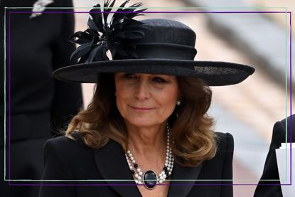 Carole Middleton wearing black hat