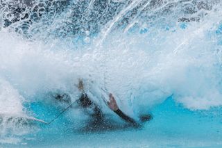 An image of a surfer at a wave park