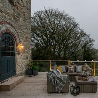 terrace with wooden floor and trees