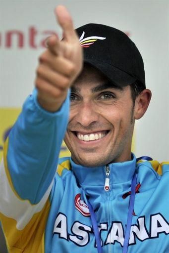 Contador celebrates his stage victroy with his usual pistolero salute