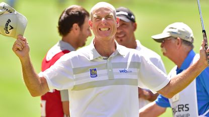 Jim Furyk celebrates after his record-breaking 58 at the 2016 Travelers Championship