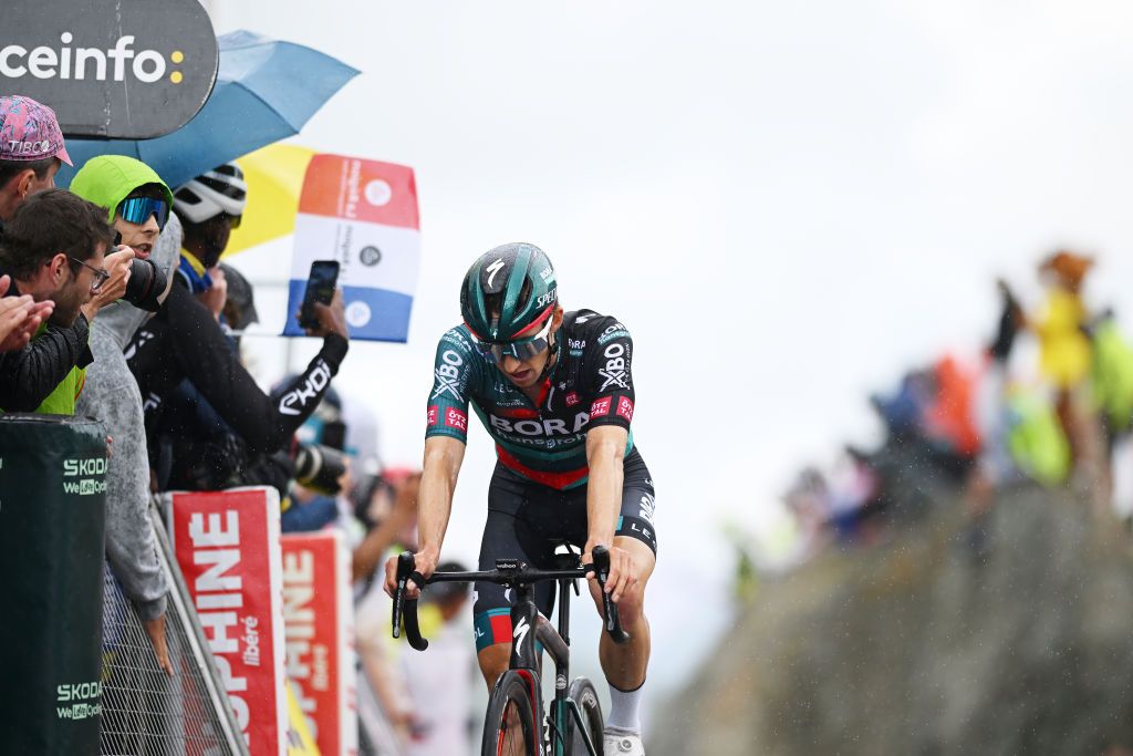 COL DE LA CROIX DE FER FRANCE JUNE 10 Jai Hindley of Australia and Team BORA hansgrohe crosses the finish line during the 75th Criterium du Dauphine 2023 Stage 7 a 1479km stage from PortedeSavoie to Col de la Croix de Fer 2067m UCIWT on June 10 2023 in Col de la Croix de Fer France Photo by Dario BelingheriGetty Images