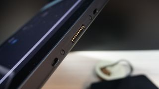 The pins that connect the tablet to the dock